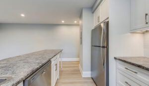 Kitchen view looking toward living area at 320 and 322 Lakeshore Road West