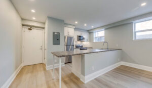 Open living area with recessed lighting and modern flooring at 320 and 322 Lakeshore Road West
