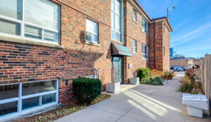 Exterior side entrance walkway at 320 and 322 Lakeshore Road West apartment building