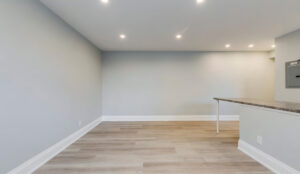Living area with modern flooring and neutral finishes at 320 and 322 Lakeshore Road West
