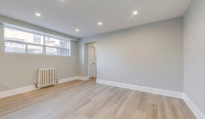 Living area with recessed lighting and modern flooring at 320 and 322 Lakeshore Road West