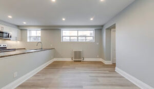 Open living and kitchen area with updated finishes at 320 and 322 Lakeshore Road West