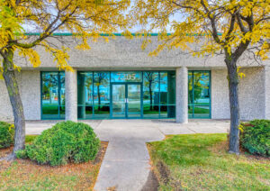 Front entrance of commercial building at 7205 Edwards Boulevard