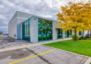 Corner exterior view of commercial building at 7205 Edwards Boulevard