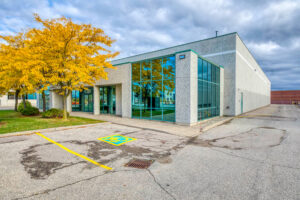 Exterior view of commercial property with parking at 7205 Edwards Boulevard