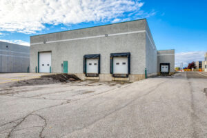 Rear loading dock area of industrial building at 7205 Edwards Boulevard