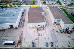 Aerial view showing parking and access at 7205 Edwards Boulevard